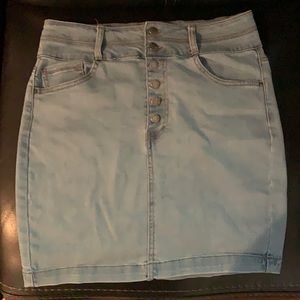 Denim miniskirt button fly very cute.